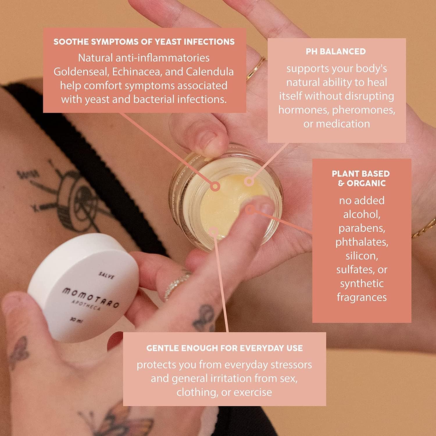 Hand holding a small container of salve with text about its benefits on a beige background